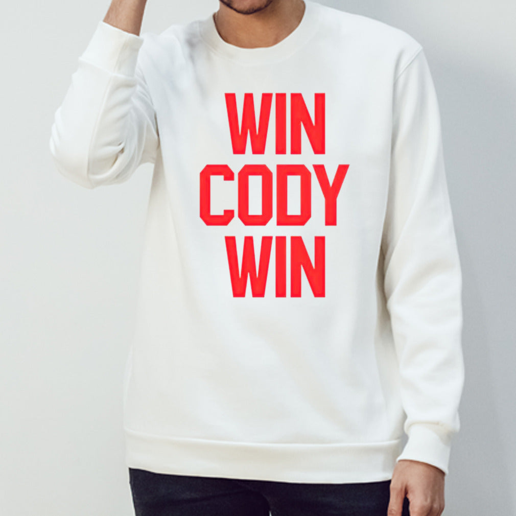 Mark Henry wearing win Cody win shirts