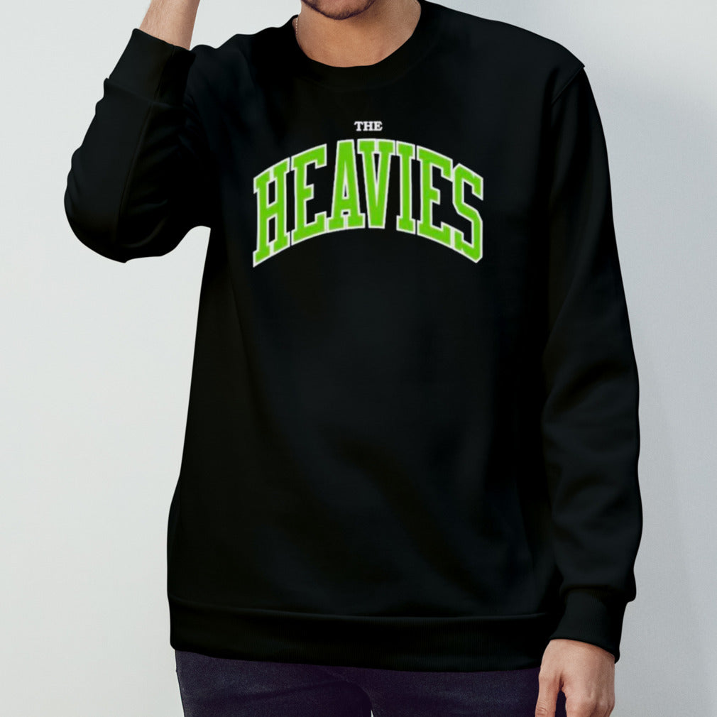 Andrew Schulz wearing the Heavies shirts