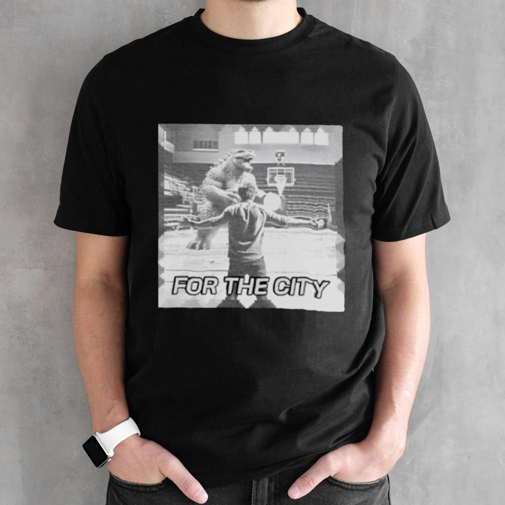 Godzilla playing basketball for the city shirts