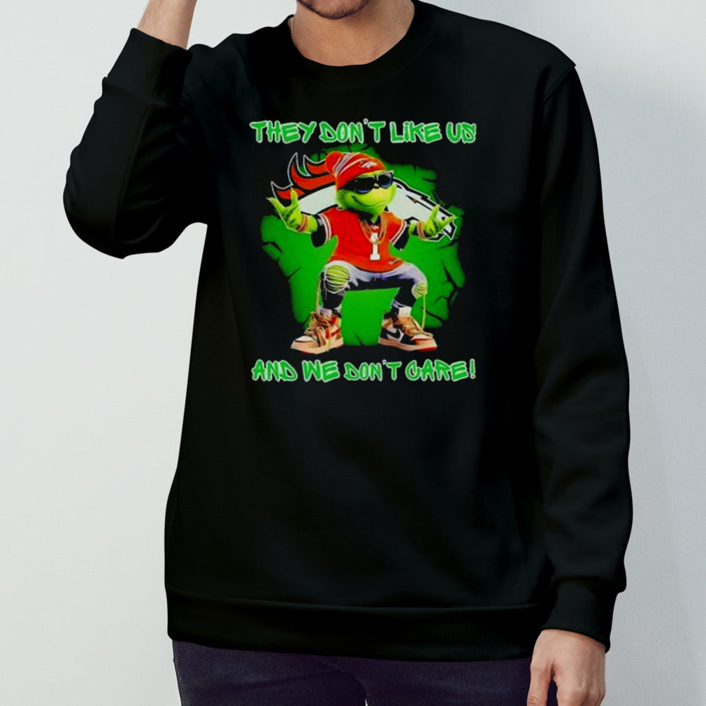 Grinch Denver Broncos They Donsâ€™t Like Us And We Donsâ€™t Care Shirts