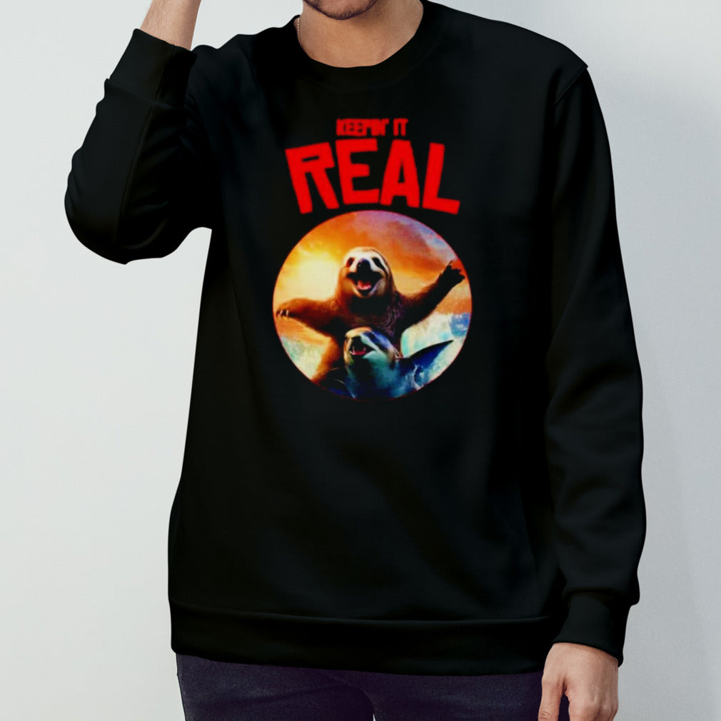 Keepinsâ€™ it real sloth riding shark shirts