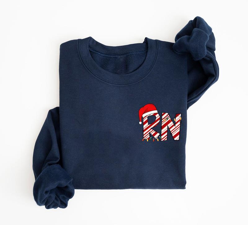 Christmas Registered Nurse Sweatshirt, Christmas Nurse Sweater, RN Christmas Gift Shirt, Merry Nurse Shirt, Christmas RN Shirt, Registered Nurse Holid