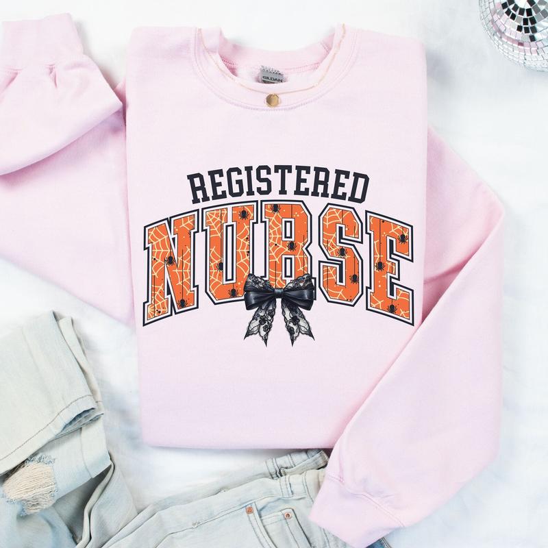 Registered Nurse Halloween Shirt, Halloween Nurse Sweatshirt, Nurse Bow Shirt, Registered Nurse Gift, Halloween Nursing Student Shirt, Unisex Shirt In