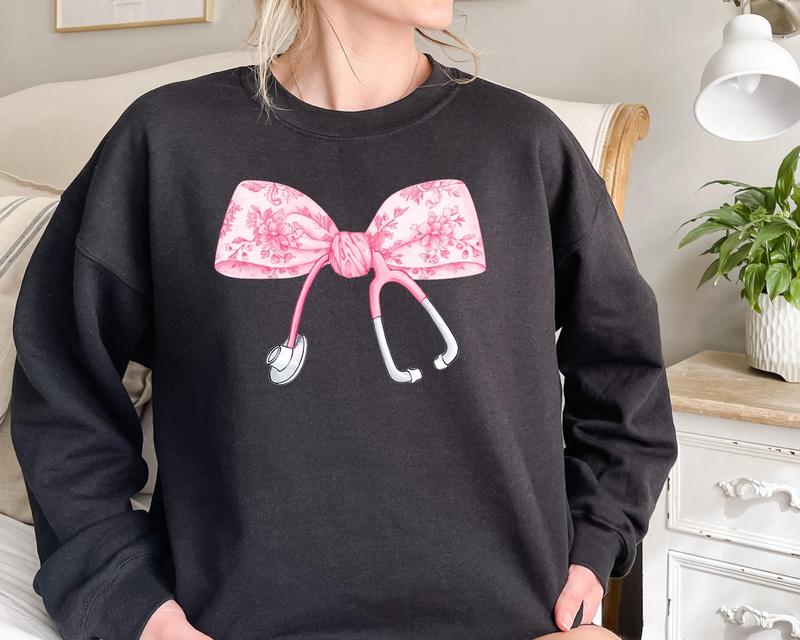 Pink Coquette Nurse Stethoscope Bow Sweatshirt, Gift for Nurse, Bow Oversized Shirt, Nurse Appreciation, Christmas Gift for Nurse, Pink Bow Sweater, G