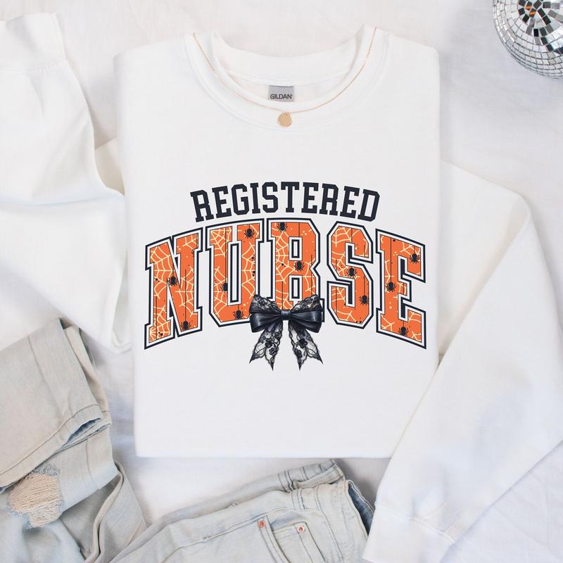 Registered Nurse Halloween Shirt, Halloween Nurse Sweatshirt, Nurse Bow Shirt, Registered Nurse Gift, Halloween Nursing Student Shirt, Unisex Shirt In